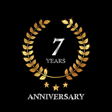 7 years gold anniversary celebration simple logo, isolated on dark background