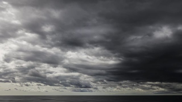 Time Lapse Of Beautiful Dark Storm Clouds Above The Sea 4K