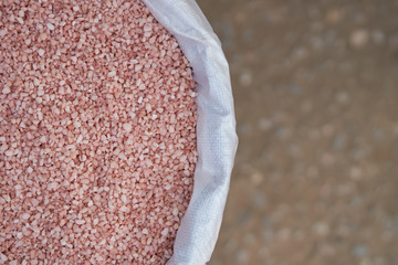 Potassium chloride, 0-0-60 , fertilizer in fertilizer bag. top view