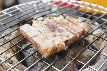 close up of meat beef sirloin grilling on stove