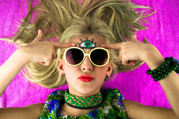 girl teenager with a third eye painted on his forehead