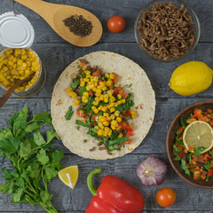 Corn tortilla prepared Mexican tacos. The view from the top.