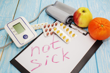 Medical pills against hypertension, equipment for measuring blood pressure in the background, the...