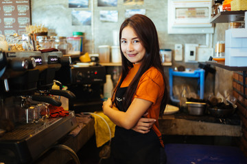 Fototapeta na wymiar Portrait of a girl baristas,Female Owner Of Coffee Shop