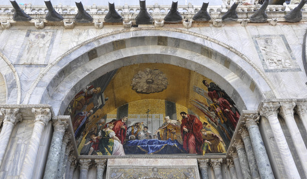 Religious painting on the front door of St. Marco Church, Venice Italy
