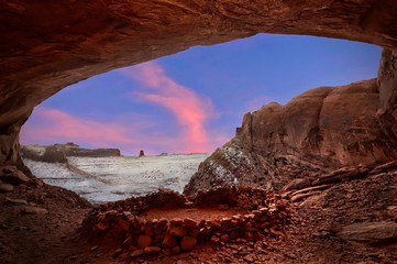 Indian spiritual place False Kiva in sandstone alcove with canyon view in winter. Sunset at Canyonlands National Park. Moab. Utah. United States.