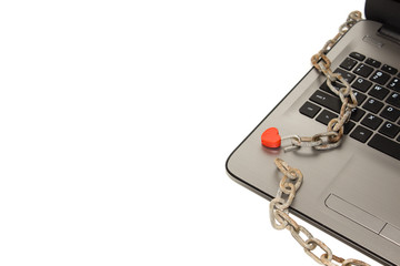 the laptop is in chains and a beautiful red closed lock. Limited access to data. Adult site
