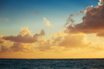 Sunset dramatic sky clouds. Nature background. Wallpaper.