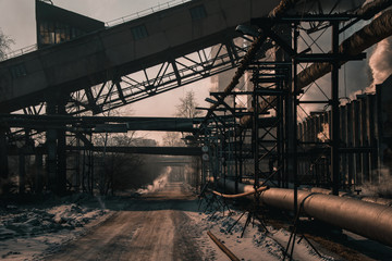 Beautiful types of winter-running thermal power plant with pipes and smoke and steam