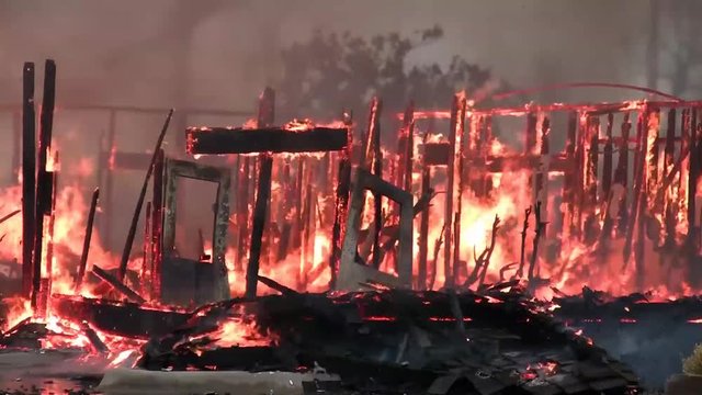 An All Consuming House Fire Burns the Remaining Wall Studs of What Was Somone's Home