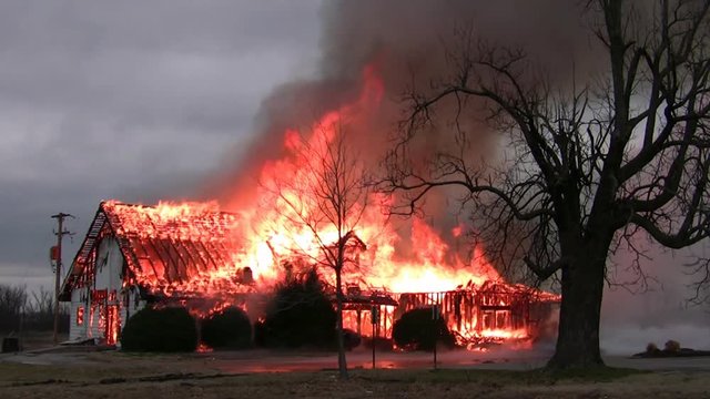 Large House Consumed By Distructrive Blazing Fire