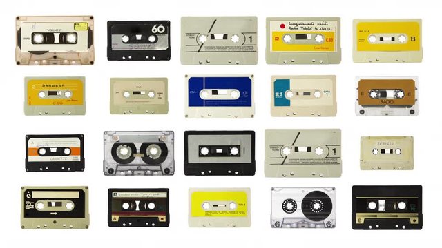 sequence of changing retro cassette music tapes made into a largefunky grid pattern