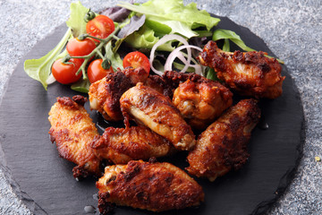 crispy barbecue chicken wings bbq on grey background