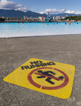 No Running Sign Next To Kitsilano Outdoor Swimming Pool.