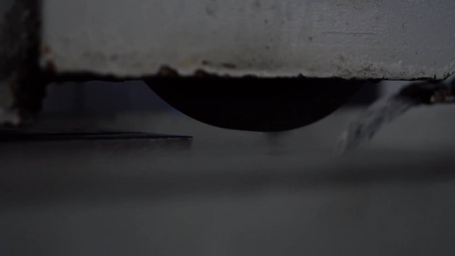 Shooting the griding of metal detail in the workshop in production