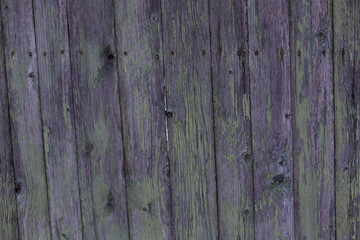 Beautiful old wooden fence with peeling paint texture background