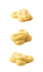 Splash of a mustard souce isolated