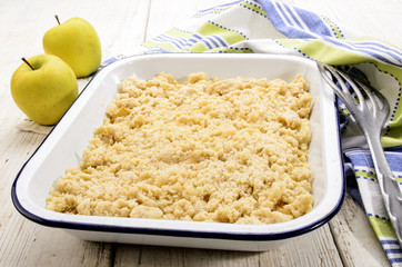 british apple crumble in an enamel bowl