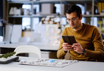 Man working in design and engineering architecture office