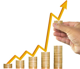 Stack of money coins arranged as graph with a man hand holding one coin and gold arrow up on money coin on white background, concept of money growth and saving money