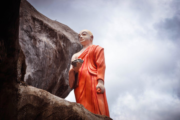 Buddhist monk statues in Dambulla, Sri Lanka
