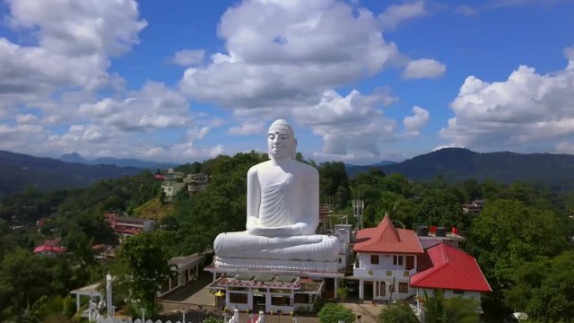 White big buddha statue temple aerial view drone footage