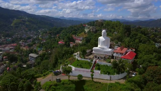 Aerial survey big buddha statue in Kandy drone footage