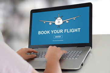 Flight booking concept on a laptop