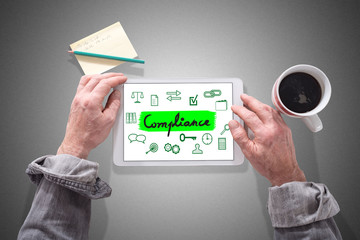 Compliance concept on a tablet