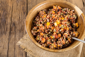 Red rice, lentils and butternut squash with carrot and quinoa in