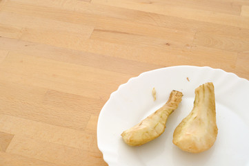 forgotten snack, two pear slices peeled and left to rot on the kitchen table, copy space