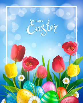 Easter greeting card with realistic glossy 3D eggs, red and yellow flowers tulip and daisy. Handwriting inscription Happy Easter. Blue sky background. Template for cards, banners, posters, calendars