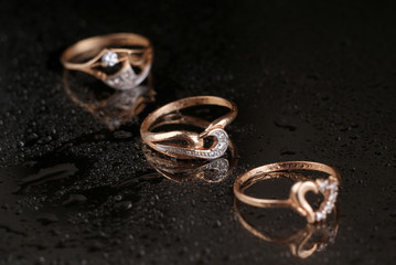 Golden rings on a black background