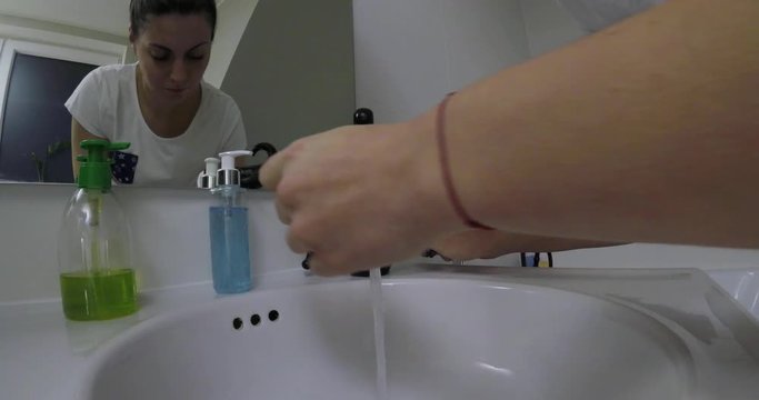 Woman wakes from sleep and she was cleansing her face