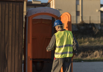 Worker man going to the bathroom portable