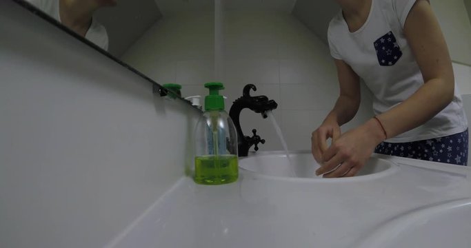 Woman wakes from sleep and she was cleansing her face