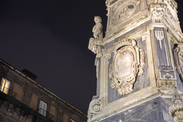 Detail of the obelisk of Piazza San Domenico in Naples, Italy, sculpted by Francesco Antonio Picchiatti and erected on the wishes of the Neapolitans as thanks for having escaped a plague epidemic.