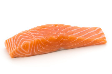 Fresh salmon fillet with basil on the white background.