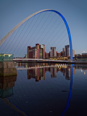 Fototapeta premium GATESHEAD, TYNE AND WEAR/UK - JANUARY 20 : View of the Millennium Bridge at dusk in Gateshead, Tyne and Wear on January 20, 2018