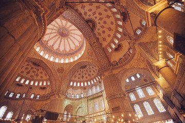 Fototapeta na wymiar ISTANBUL, TURKEY - JAN 13, 2018: Interior of the Sultanahmet Mosque (Blue Mosque) in Istanbul