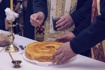 cutting Orthodox pancakes, church customs, Serbia