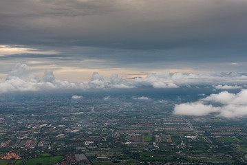 view from airplane to land with cloud