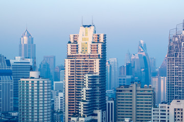 Fototapeta na wymiar 27 January, 2018: top view crowd landscape city in Asoke Bangkok, Thailand with blue morning image