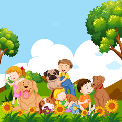 Obraz na płótnie Canvas Children and pet dogs in garden
