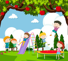 Obraz na płótnie Canvas Children playing slide and bouncing on trampoline