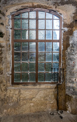 The window in the stone wall of the Castle Rock