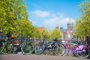 Fototapeta na wymiar Pink bicycle in Amsterdam, Netherlands