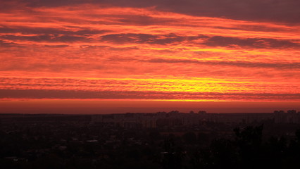 The red sunrise above the city of Kharkiv.