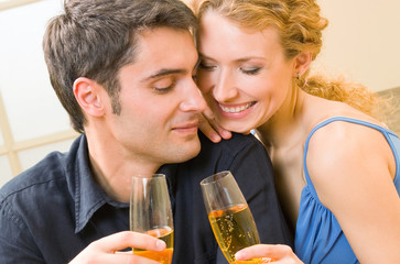 Cheerful couple with champagne