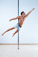 Pole dancing man